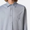 Chemise à manches longues confortable avec poche poitrine boutonnée Chemise à manches longues confortable avec poche poitrine boutonnée