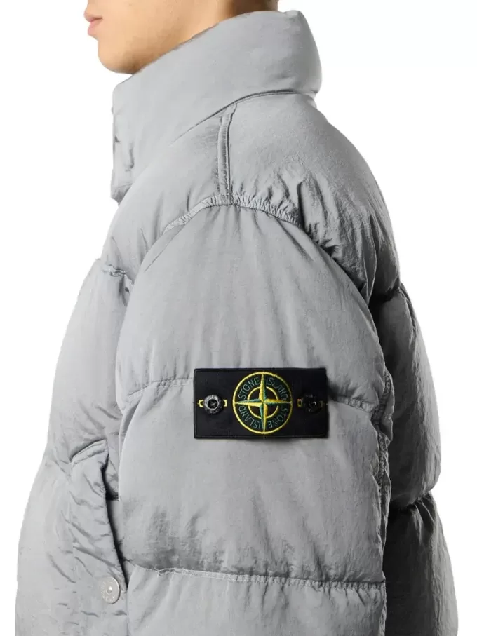 Doudoune avec protection anti-chute et poches à boutons-pression Doudoune avec protection anti-chute et poches à boutons-pression