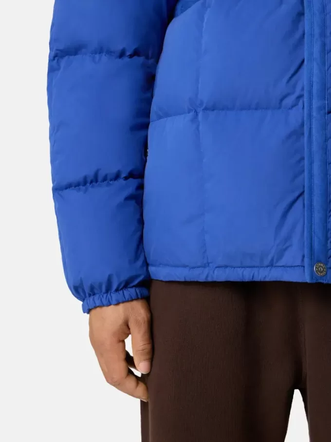 Doudoune à capuche avec poches anti-chute et à boutons-pression Doudoune à capuche avec poches anti-chute et à boutons-pression