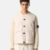 Gilet avec fermeture à boutons et empiècements en caoutchouc Gilet avec fermeture à boutons et empiècements en caoutchouc