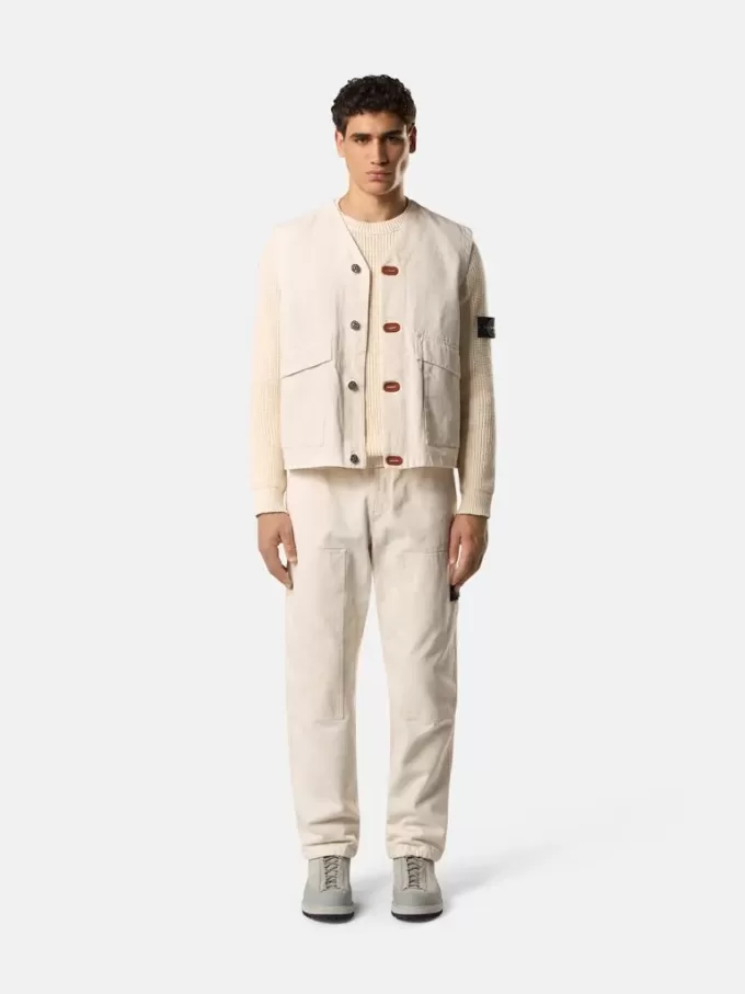 Gilet avec fermeture à boutons et empiècements en caoutchouc Gilet avec fermeture à boutons et empiècements en caoutchouc