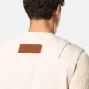 Gilet avec fermeture à boutons et empiècements en caoutchouc Gilet avec fermeture à boutons et empiècements en caoutchouc