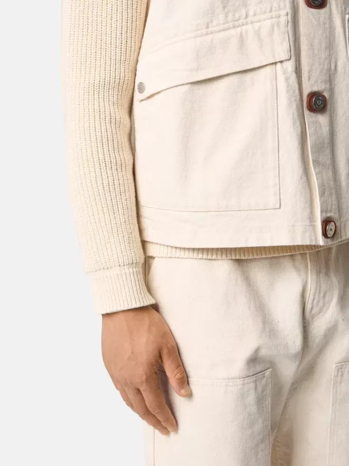Gilet avec fermeture à boutons et empiècements en caoutchouc Gilet avec fermeture à boutons et empiècements en caoutchouc