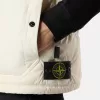 Gilet avec finition déperlante et poches à boutons-pression Gilet avec finition déperlante et poches à boutons-pression