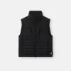 Gilet en duvet avec tunnels sans coutures et traitement anti-chute. Gilet en duvet avec tunnels sans coutures et traitement anti-chute.