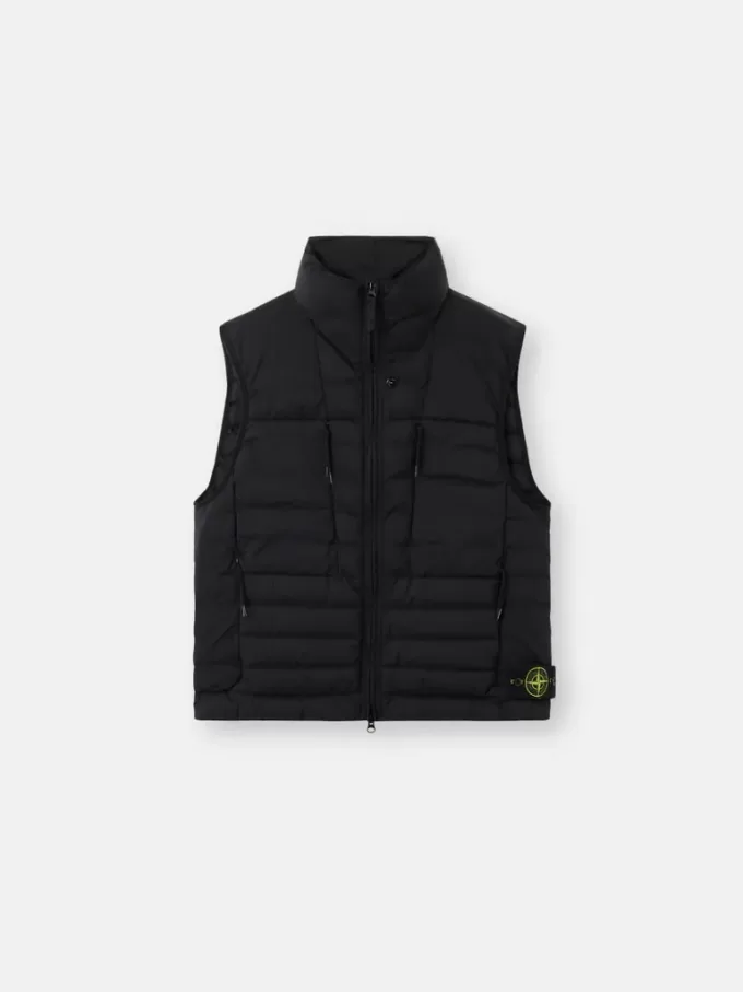 Gilet en duvet avec tunnels sans coutures et traitement anti-chute. Gilet en duvet avec tunnels sans coutures et traitement anti-chute.