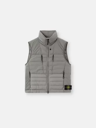 Gilet en duvet avec tunnels sans coutures et traitement anti-chute. Gilet en duvet avec tunnels sans coutures et traitement anti-chute.