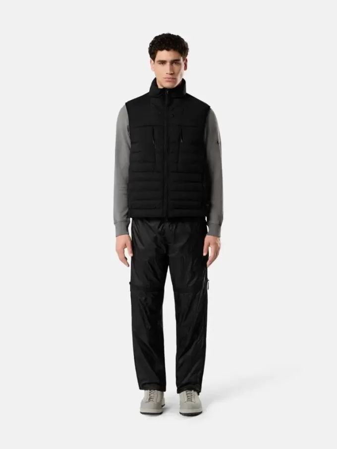 Gilet en duvet avec tunnels sans coutures et traitement anti-chute. Gilet en duvet avec tunnels sans coutures et traitement anti-chute.