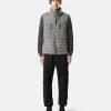 Gilet en duvet avec tunnels sans coutures et traitement anti-chute. Gilet en duvet avec tunnels sans coutures et traitement anti-chute.