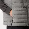Gilet en duvet avec tunnels sans coutures et traitement anti-chute. Gilet en duvet avec tunnels sans coutures et traitement anti-chute.