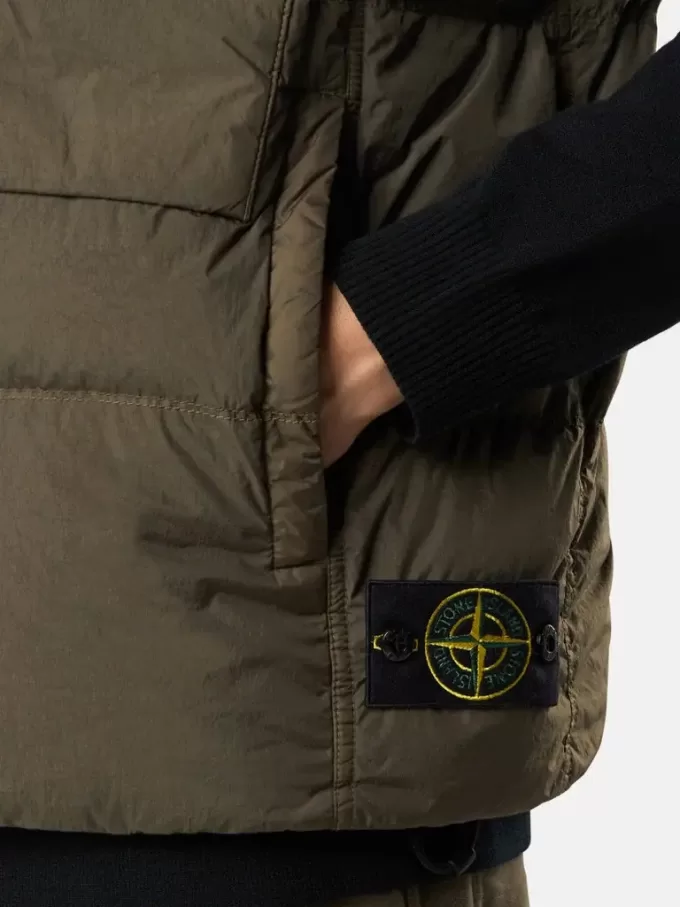 Gilet en duvet coupe-vent avec poches zippées Gilet en duvet coupe-vent avec poches zippées