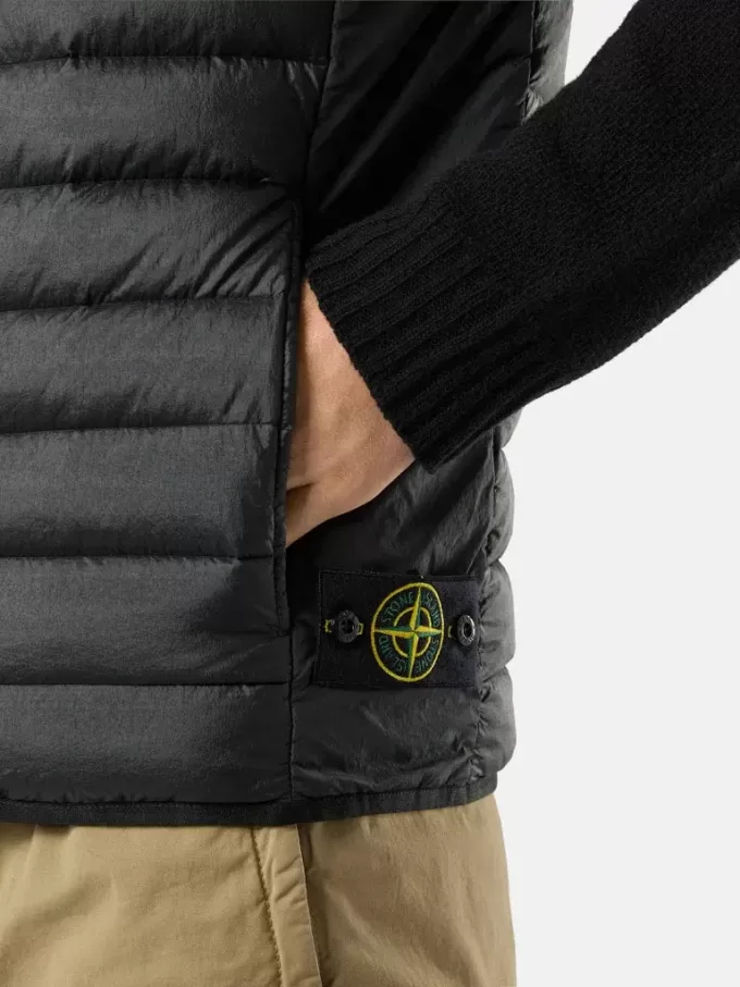 Gilet léger à fermeture éclair avec traitement anti-chute Gilet léger à fermeture éclair avec traitement anti-chute
