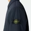 Manteau court rembourré avec poches anti-chute et à boutons-pression Manteau court rembourré avec poches anti-chute et à boutons-pression