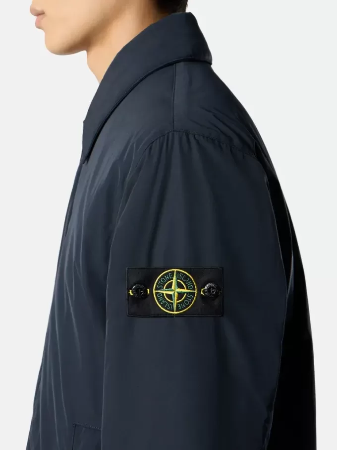 Manteau court rembourré avec poches anti-chute et à boutons-pression Manteau court rembourré avec poches anti-chute et à boutons-pression