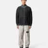 Pantalon cargo ample avec sangles réglables à la taille. Pantalon cargo ample avec sangles réglables à la taille.