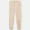 Pantalon cargo à coupe regular-tapered avec poches zippées. Pantalon cargo à coupe regular-tapered avec poches zippées.