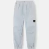 Pantalon de survêtement ample avec poches à boutons-pression et zippées Pantalon de survêtement ample avec poches à boutons-pression et zippées