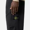 Pantalon de survêtement ample avec poches à boutons-pression et zippées Pantalon de survêtement ample avec poches à boutons-pression et zippées