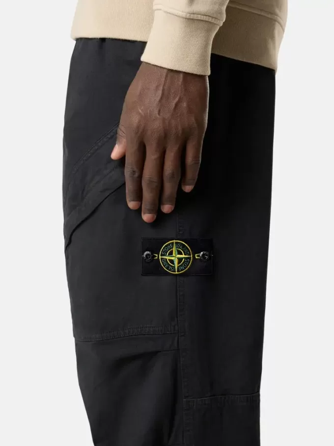 Pantalon de survêtement ample avec poches à boutons-pression et zippées Pantalon de survêtement ample avec poches à boutons-pression et zippées