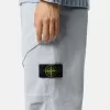 Pantalon de survêtement ample avec poches à boutons-pression et zippées Pantalon de survêtement ample avec poches à boutons-pression et zippées