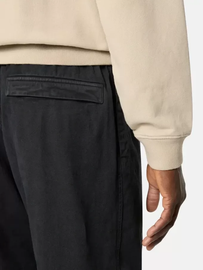 Pantalon de survêtement ample avec poches à boutons-pression et zippées Pantalon de survêtement ample avec poches à boutons-pression et zippées