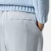 Pantalon de survêtement ample avec poches à boutons-pression et zippées Pantalon de survêtement ample avec poches à boutons-pression et zippées