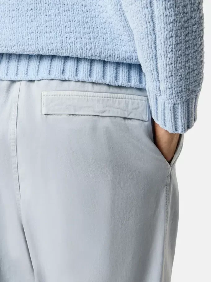 Pantalon de survêtement ample avec poches à boutons-pression et zippées Pantalon de survêtement ample avec poches à boutons-pression et zippées