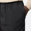 Pantalon de survêtement ample avec poches à boutons-pression et zippées Pantalon de survêtement ample avec poches à boutons-pression et zippées