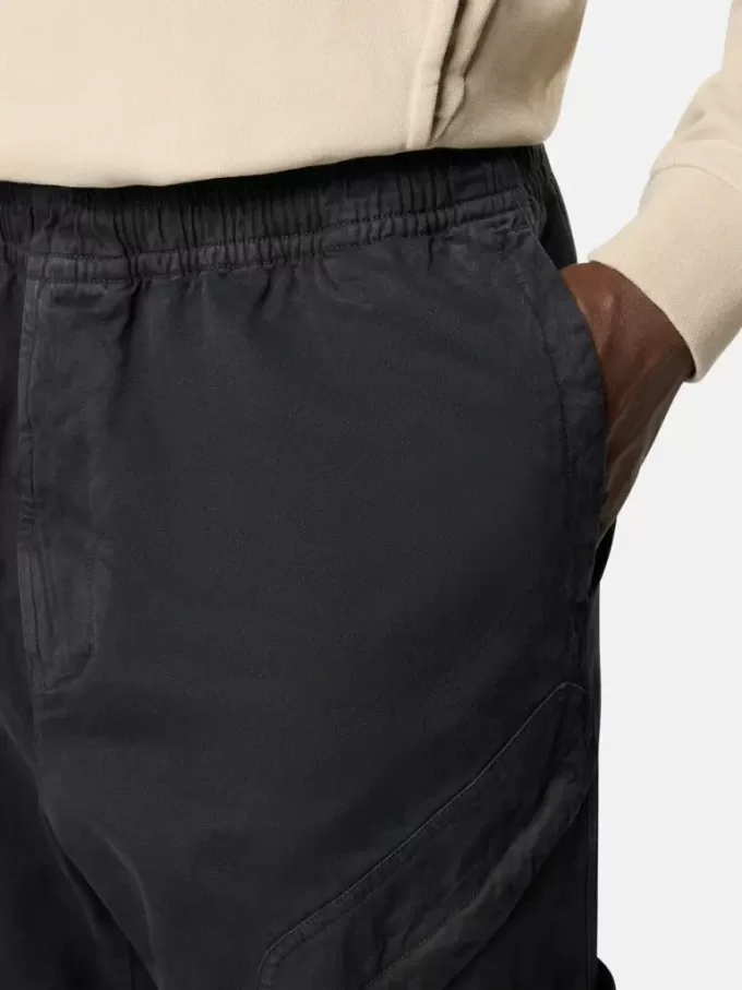 Pantalon de survêtement ample avec poches à boutons-pression et zippées Pantalon de survêtement ample avec poches à boutons-pression et zippées