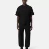 Pantalon de survêtement ample avec poches et poignets élastiqués Pantalon de survêtement ample avec poches et poignets élastiqués