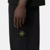 Pantalon de survêtement ample avec poches et poignets élastiqués Pantalon de survêtement ample avec poches et poignets élastiqués