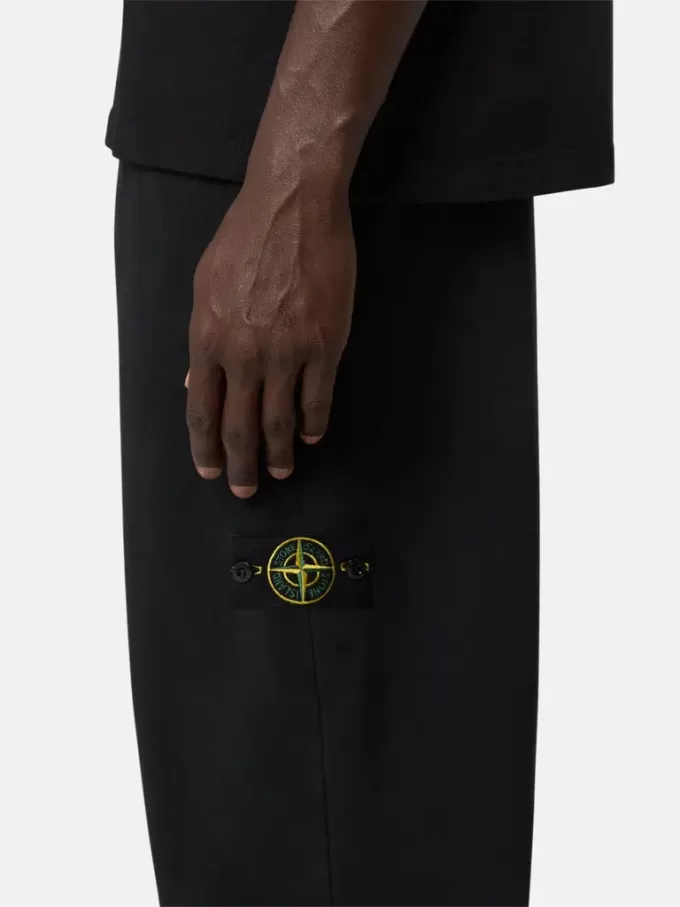 Pantalon de survêtement ample avec poches et poignets élastiqués Pantalon de survêtement ample avec poches et poignets élastiqués