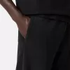Pantalon de survêtement ample avec poches et poignets élastiqués Pantalon de survêtement ample avec poches et poignets élastiqués