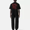Pantalon de survêtement ample avec poches et poignets élastiqués Pantalon de survêtement ample avec poches et poignets élastiqués