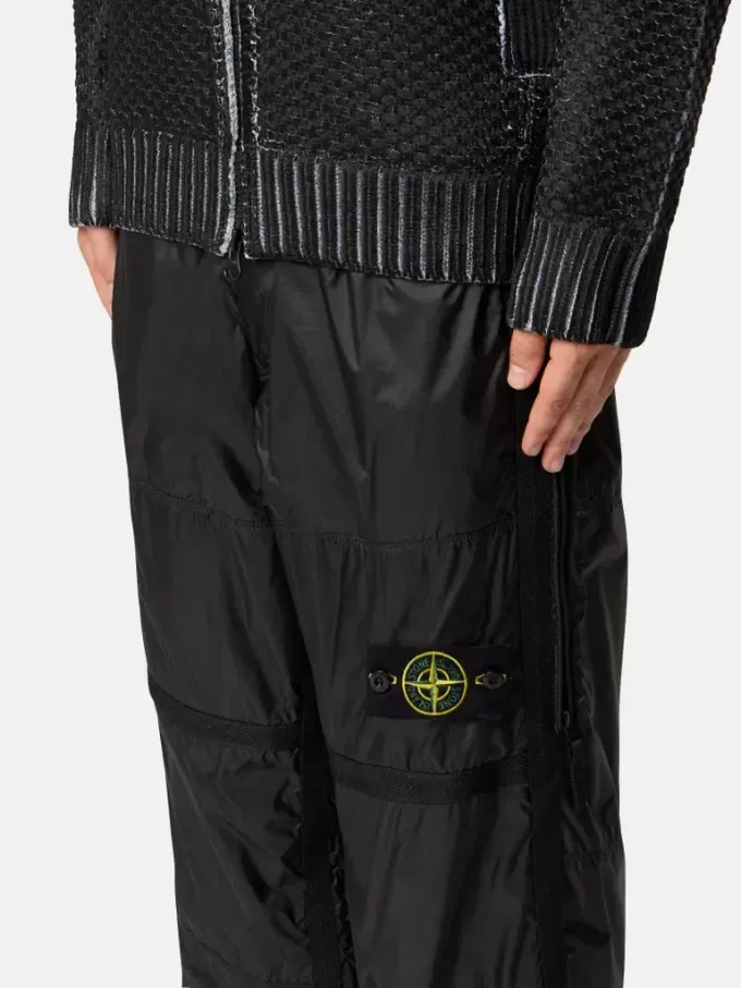 Pantalon de survêtement ample avec poches zippées et chevilles ajustables Pantalon de survêtement ample avec poches zippées et chevilles ajustables