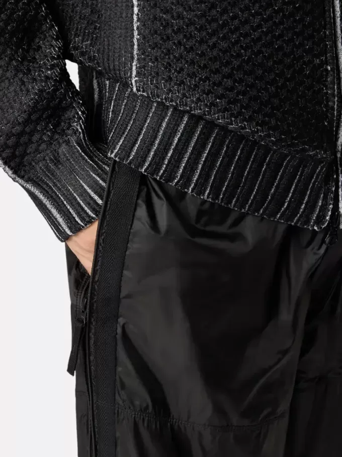 Pantalon de survêtement ample avec poches zippées et chevilles ajustables Pantalon de survêtement ample avec poches zippées et chevilles ajustables