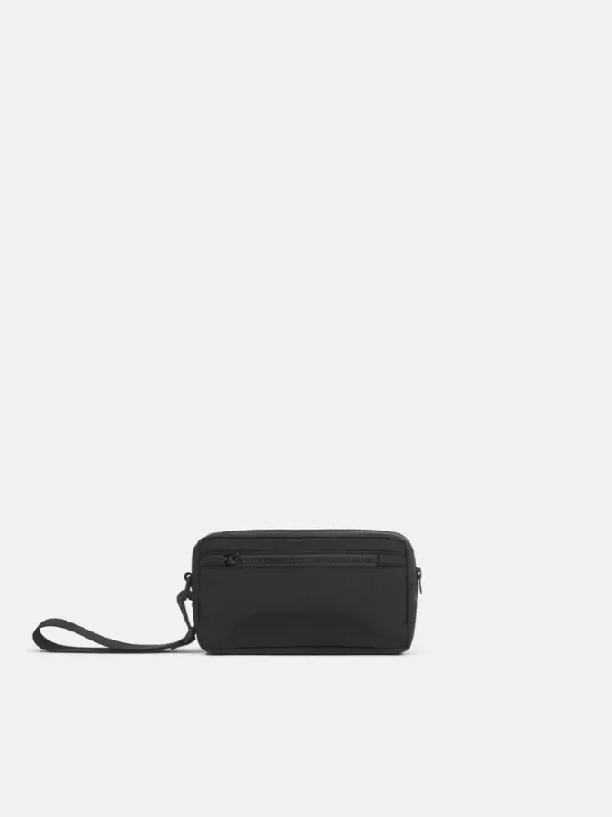 Pochette rembourrée à fermeture éclair avec poches et sangle