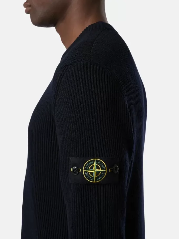 Pull à col rond avec bordures côtelées