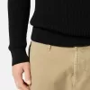Pull à col rond avec bordures côtelées