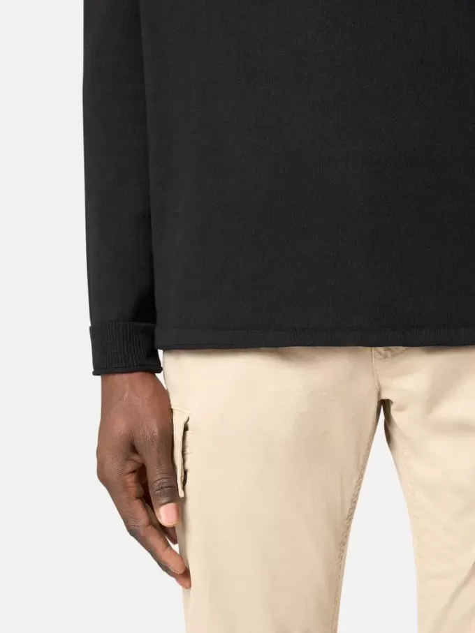 Pull à col rond avec petits détails roulés