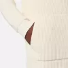 Pull zippé avec poches et côtes de pêcheur. Pull zippé avec poches et côtes de pêcheur.