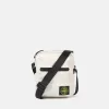 Sac pochette avec compartiments zippés et bandoulière réglable Sac pochette avec compartiments zippés et bandoulière réglable