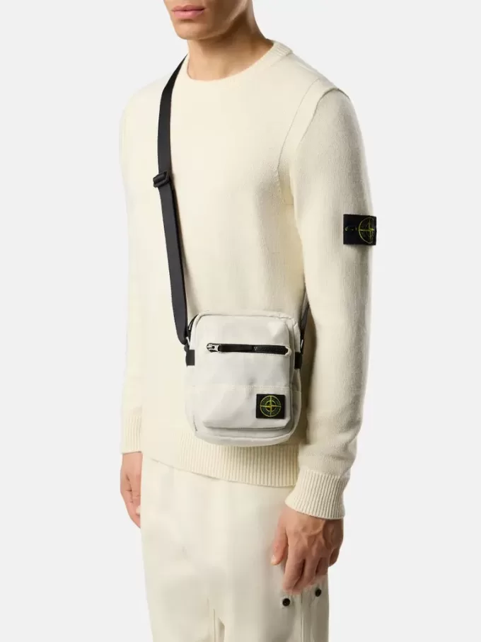 Sac pochette avec compartiments zippés et bandoulière réglable Sac pochette avec compartiments zippés et bandoulière réglable