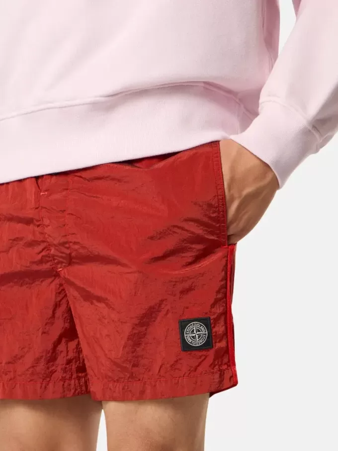 Short de bain slim fit avec poches et doublure en maille Short de bain slim fit avec poches et doublure en maille