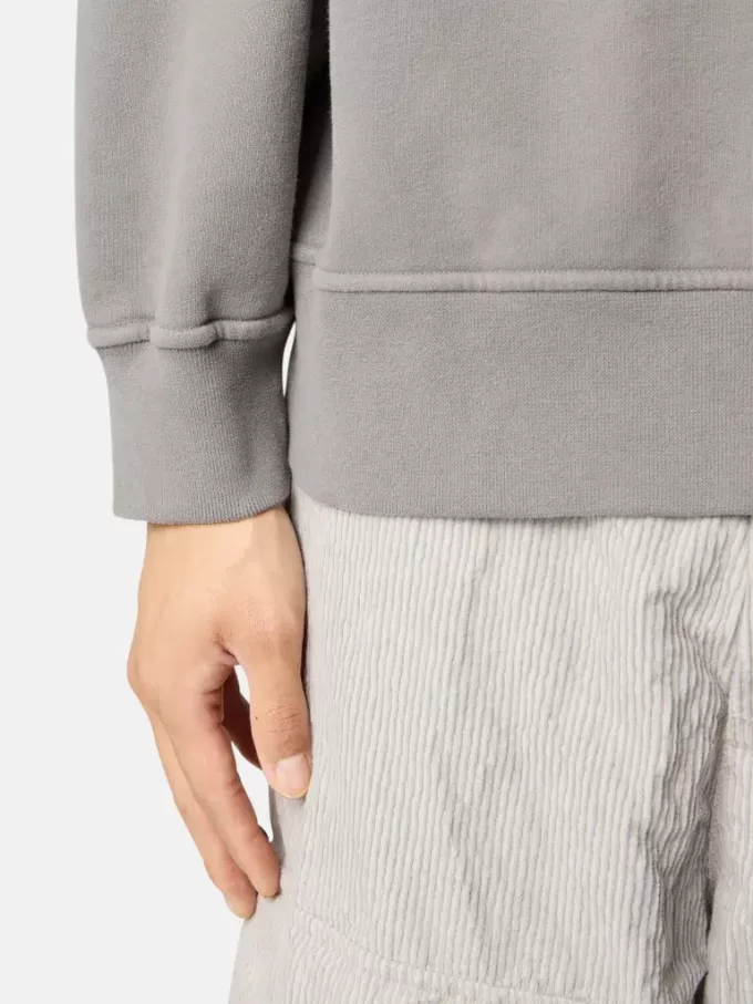 Sweat à capuche oversize avec manches raglan.