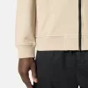 Sweat-shirt à capuche et fermeture éclair, coupe classique, avec poches sur les manches.