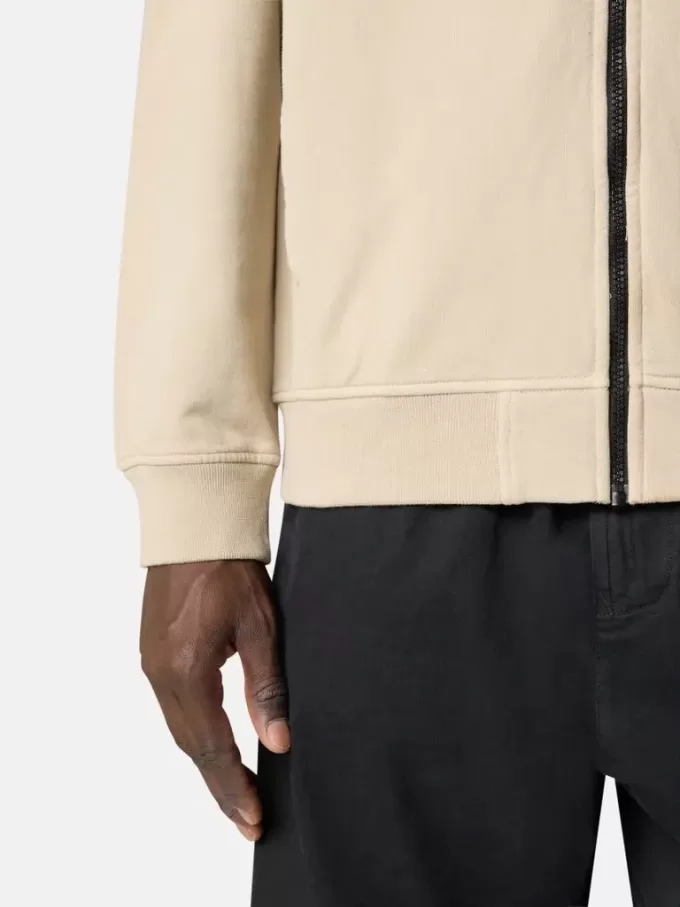 Sweat-shirt à capuche et fermeture éclair, coupe classique, avec poches sur les manches.