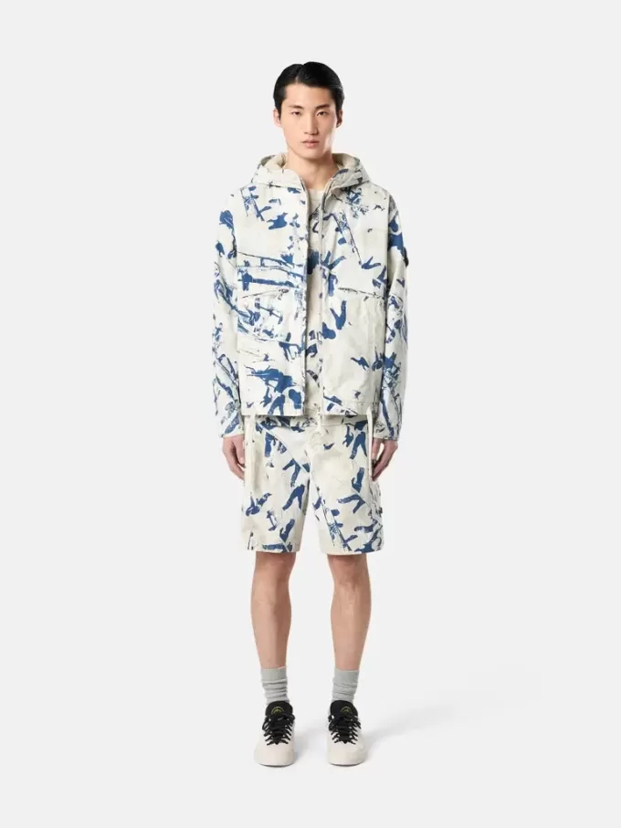Veste à capuche avec imprimé camouflage et traitement anti-gouttes Veste à capuche avec imprimé camouflage et traitement anti-gouttes