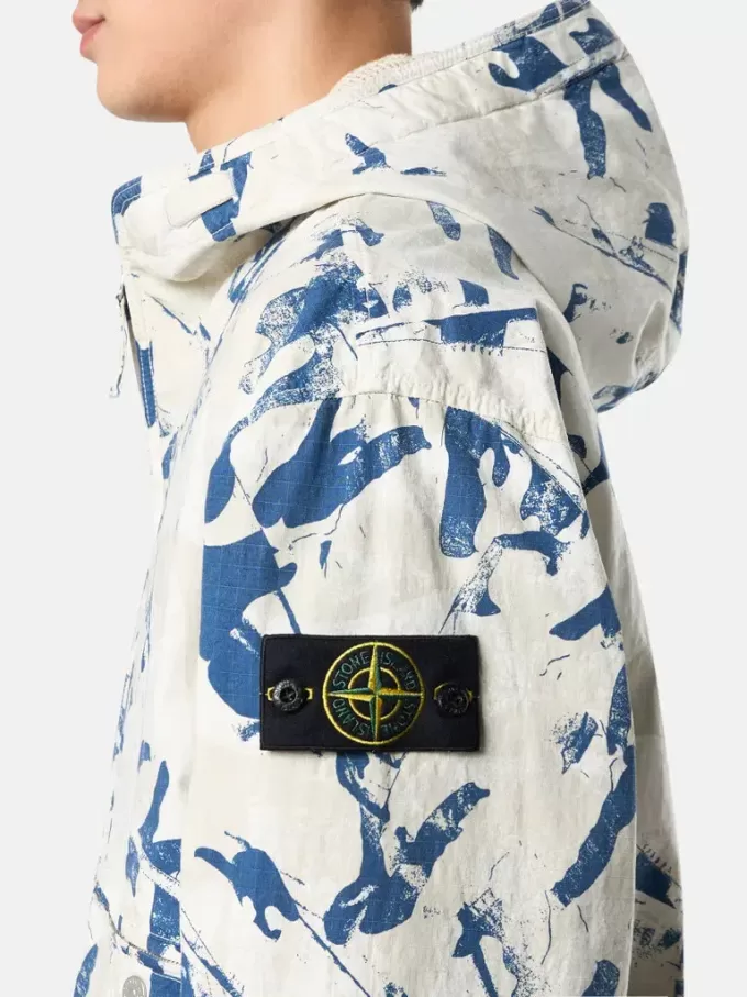 Veste à capuche avec imprimé camouflage et traitement anti-gouttes Veste à capuche avec imprimé camouflage et traitement anti-gouttes