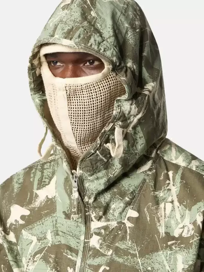 Veste à capuche avec imprimé camouflage et traitement anti-gouttes Veste à capuche avec imprimé camouflage et traitement anti-gouttes